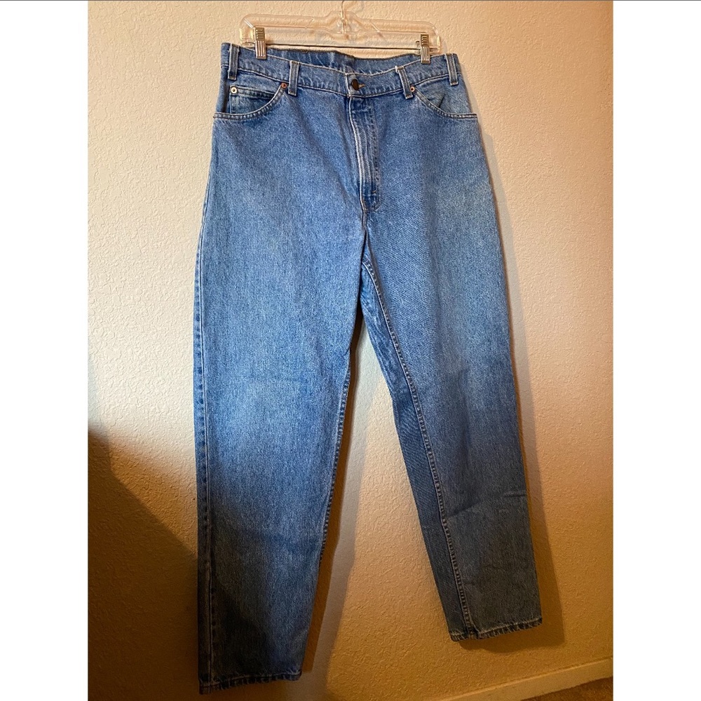 VINTAGE ORANGE TAB 550 LEVI’s